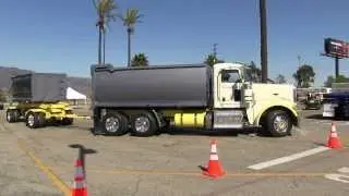 Bruce Campbell In A Peterbilt 388 With Rogue Transfer-Dump Setup Arriving At Truckin' For Kids 2013.