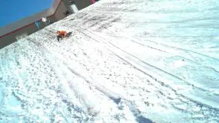 Bryce sledding down QT hill