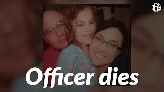Police officer dies after rescuing woman in water
