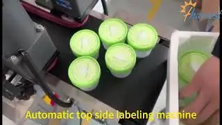 Automatic top labeling machine for caps , labeling machine for top side labeling | top labeler