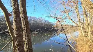PAT PERCHED ABOVE THE ST. JOSEPH RIVER ACROSS FROM ST. PATRICK'S COUNTY PARK. 