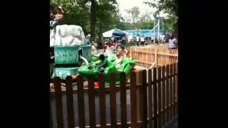 Sophia riding the Frog Hopper at Dutch Wonderland