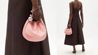 Jil Sander bag. Sphere supple-leather clutch.