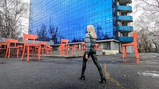 Shopping  in pvc puffer and leather jacket.