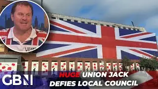 Огромный флаг Великобритании, вывешенный на здании бывшего совета, бросает вызов местным властям.
