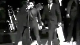 James Brown takes control as fans rush the stage Live at the Boston Garden April 5, 1968
