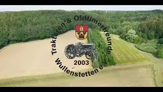 Stoppelfest Wullenstetten 2022 - Garben binden mit Fella Bindem&auml;her