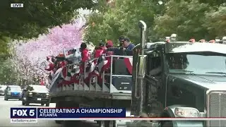 Confetti cannons fire off during Braves parade