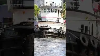 Tugboats in Action: Navigating Tight Quarters to Maneuver Cargo in the Bustling Miami River! 🚢🌊⚓