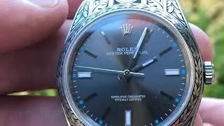 Hand engraved Rolex with tiger theme