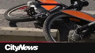 Heated exchange between cyclists and Toronto Police officer during ghost bike ride