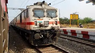 Ajni WAP7 with 11302 KSR Bengaluru CSMT Mumbai Udyan Express Train at Kedgaon Railway Station Pune