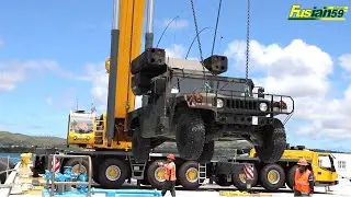 Loading Military Equipment To Marine Vessel With Crane Grove GMK7550