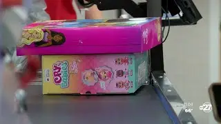 Thomas County Central High School students shop for Christmas gifts with elementary school students