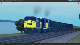 CSX 5107 (Thomas Rice) Leads westbound CSX E209 through Peach Street in Norge, VA with a GP38 in tow