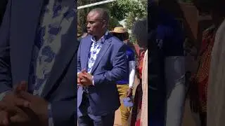 Lord Mayor Erias Lukwago,wife and daughter arrive at the polling station.