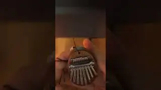 The Office theme song on mini Kalimba