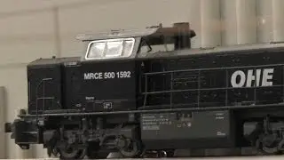 500-1296 MaK G1206BB OHE with DHL tankertrain chasing in Miwula, HO scal 1:87, Hamburg,