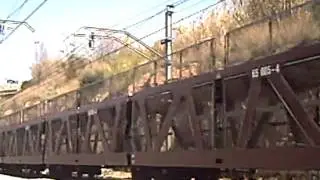 254 con tren autometro pasando por martorell