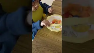 Cute baby eating papaya 😘