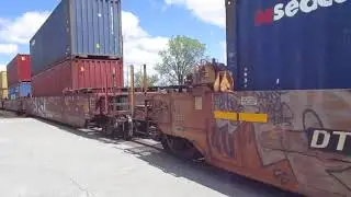 CSX southbound turning westbound intermodal train in Fostoria Ohio.