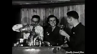 Vintage 1940s New Year's Eve party 8mm found home movie clip basement bar drinking dancing kissing