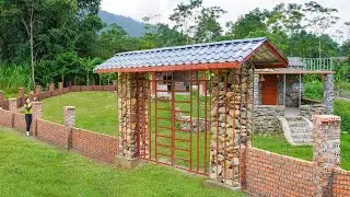 Building Strong Big Pillars And Long Fence Of Red Bricks Connecting From The Stone Gate