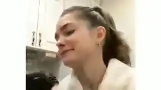 Cat hits girl in face
