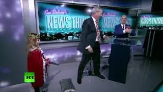 Nigel Farage is knighted on Russia Today by small child who hates him