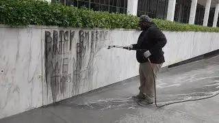 Clean Up Crews Wash Graffiti Left by Los Angeles Protesters