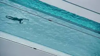 Watch a swimmer in London's fully transparent Sky Pool