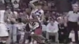 Keith Booth scores on Cherokee Parks