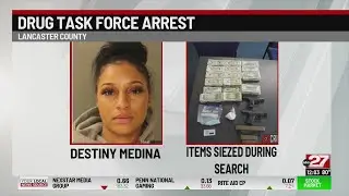 Man wanted, woman charged after Lancaster drug raid