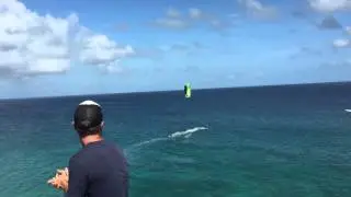 Nick Jacobsen jumping out of richard branson's house moskito island (mosquito island) kitesurfing