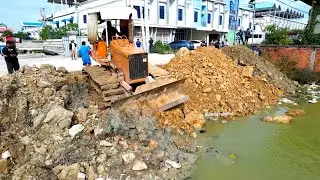 Nicely !! First Start New project Landfilling by Dump truck 5T unloading Stone and bulldozer pushing
