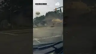 Train DEMOLISHES tractor trailer sitting on tracks