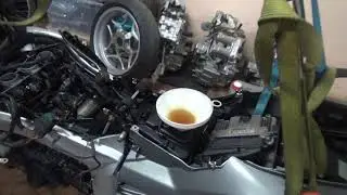 BMW K 1200GT (K44) 2006. Cómo instalar el motor. Paso 15, cambiar el aceite de motor y filtro.