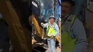 Loading a 140M Grader on a lowboy