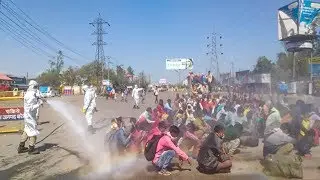 Migrant Workers Sprayed with Disinfectant in India