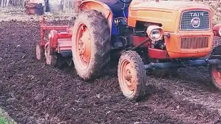 Freza de pamant Kubota si tractor Fiat215
