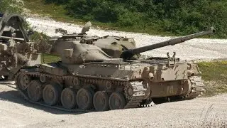 Chieftain battle tank gets tugged about by armoured recovery vehicles