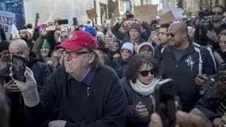 Michael Moore visits Trump Tower when Anti-Trump protesters marched up Fifth Avenue