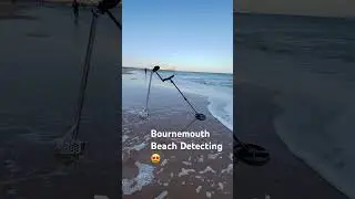 Summer Bournemouth beach detecting