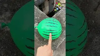 Experiment: Will a water balloon explode if it rolls down from a tall building? 💥 #balloon