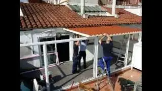 SECUENCIA DE MONTAJE DE UN CERRAMIENTO EXTERIOR DE FABRICACION PROPIA EN UNA TERRAZA DE UN ATICO