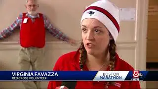 Boston Marathon runners brave rain, cold weather