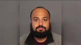 Dean of Aurora school threatened to `shoot the kneecaps off` school administrators, affidavit says