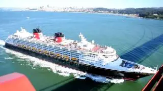 Disney Wonder passes under the Golden Gate Bridge