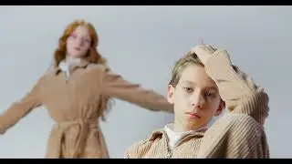 Girl and Boy Posing at the Camera