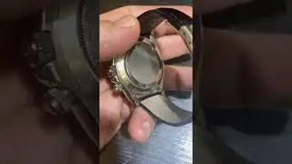 Rolex Daytona diamond bezel.